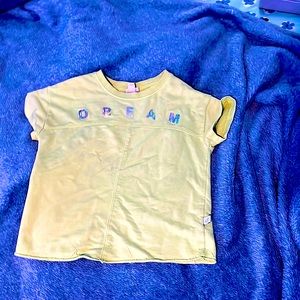 I’m selling a kids yellow tee shirt hardly worn